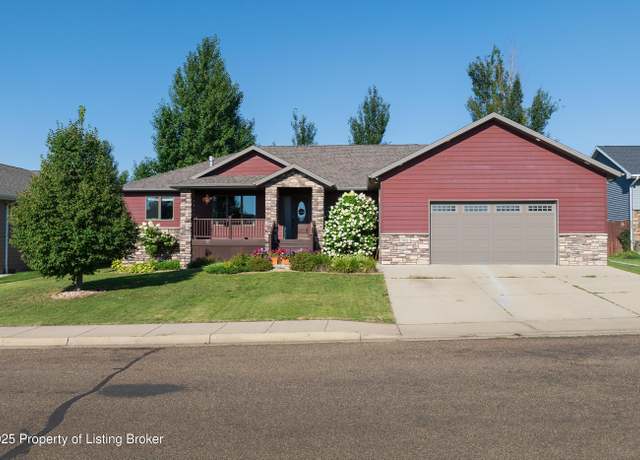 Property at 861 Mustang Ave, Dickinson, ND 58601, 5 beds, 3 baths