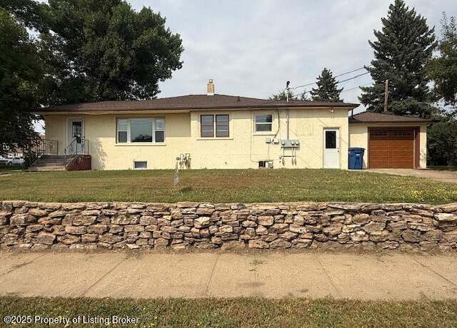 Property at 507 2nd St E, Dickinson, ND 58601, 5 beds, 3 baths