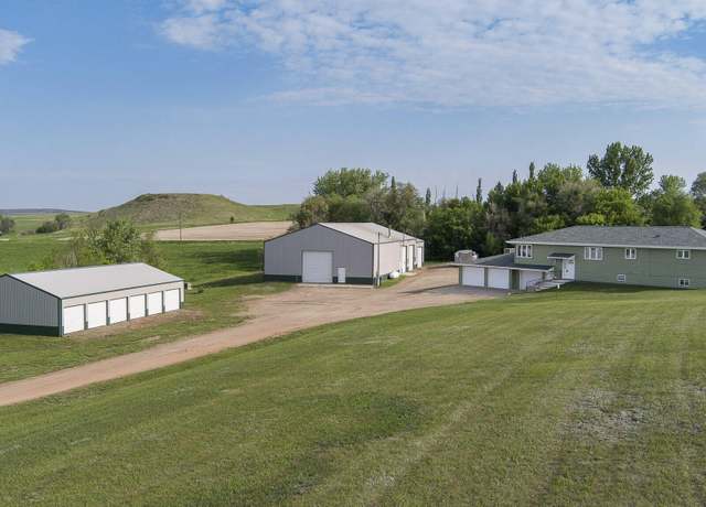 Property at 571 58th Ave SW, Beulah, ND 58523, 5 beds, 3 baths