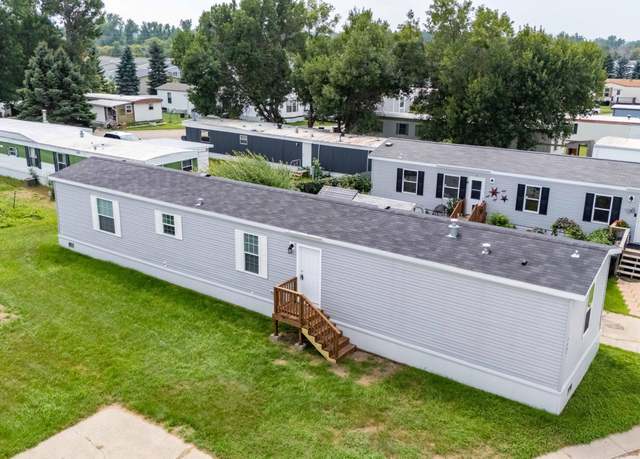 Property at 1401 Pioneer Trl, Mandan, ND 58554, 3 beds, 2 baths