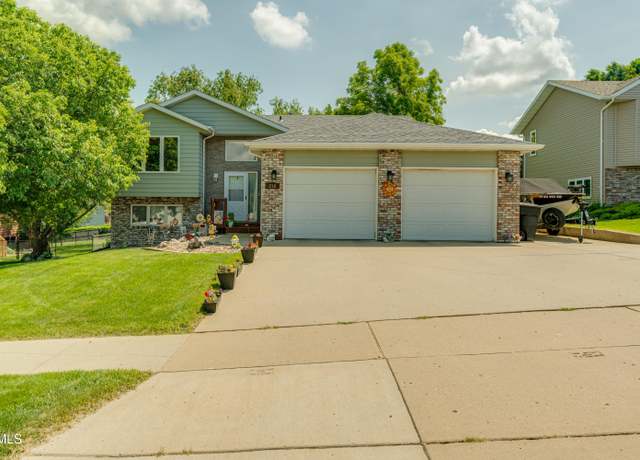 Property at 219 E Calgary Ave, Bismarck, ND 58503, 4 beds, 2 baths