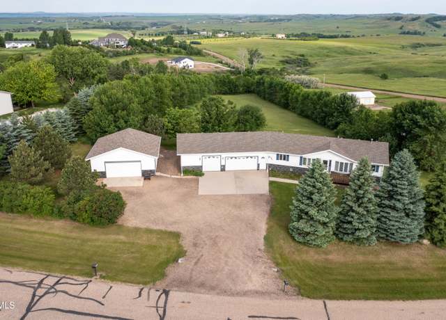 Property at 10900 Rose Dr, Bismarck, ND 58503, 4 beds, 2.5 baths