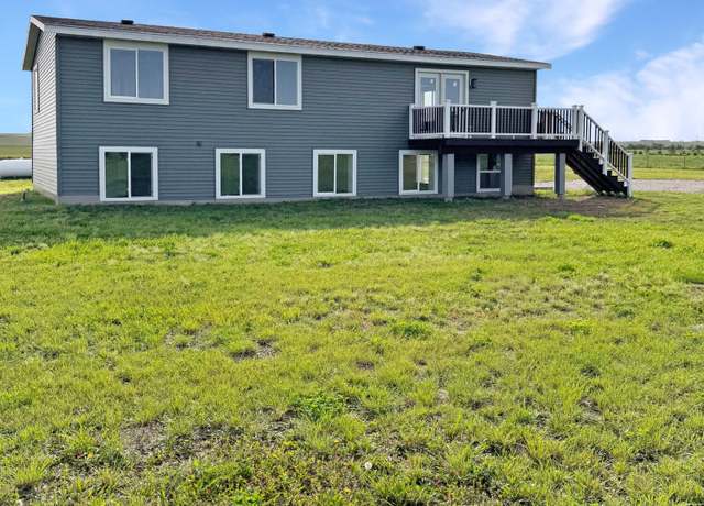Property at 5828 132nd Dr NW, Williston, ND 58801, 7 beds, 4 baths