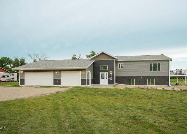 Property at 5706 Olive Tree Dr, Bismarck, ND 58503, 4 beds, 3 baths