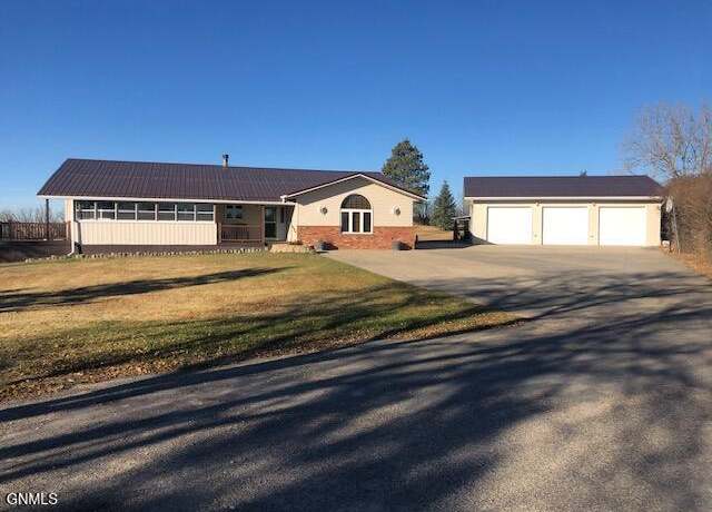 Property at 13948 Town & Country Ct S, Williston, ND 58801, 4 beds, 3 baths