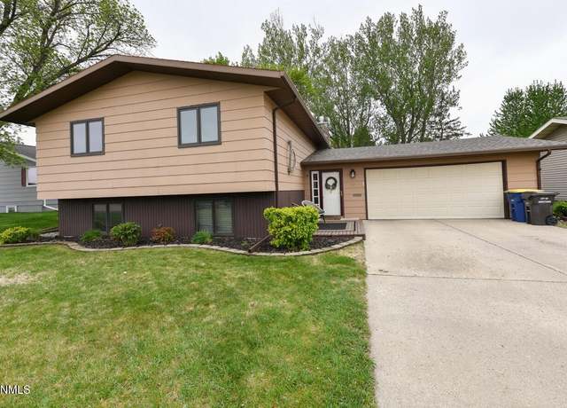 Property at 1407 6th Ave NE, Jamestown, ND 58401, 4 beds, 2 baths