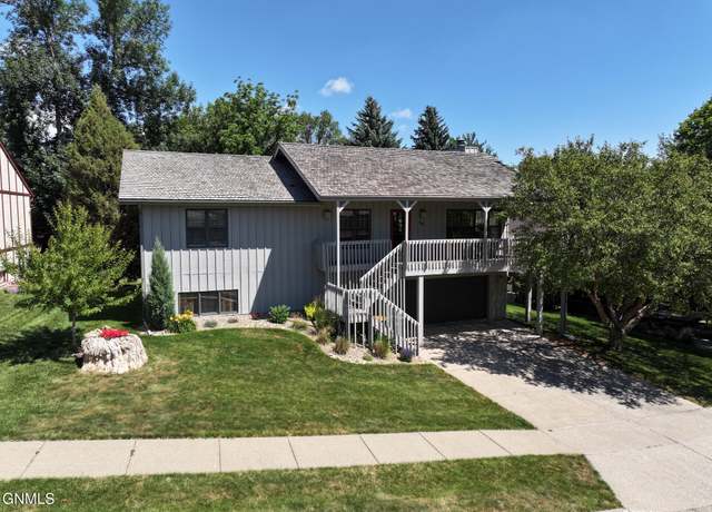 Property at 516 Portage Dr, Bismarck, ND 58503, 4 beds, 3 baths