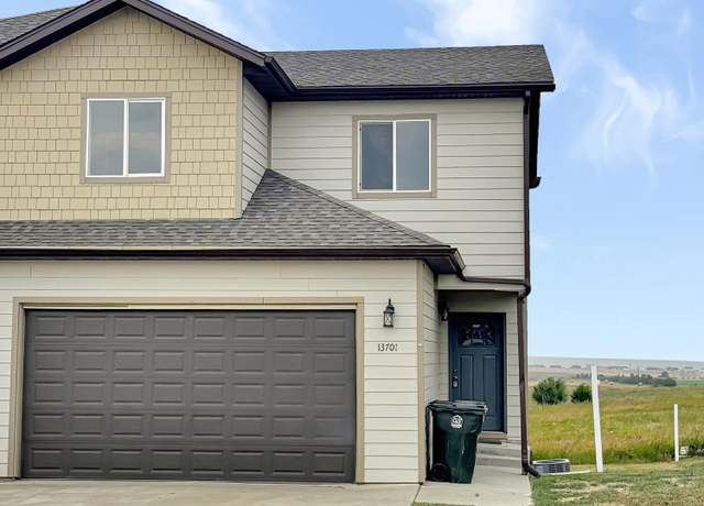 Property at 13701 Kristina St, Williston, ND 58801, 4 beds, 3 baths