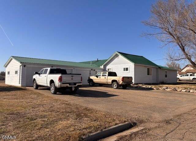 Property at 422 Jackson St, Plentywood, MT 59254, 4 beds, 2 baths