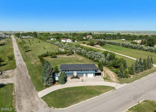 Property at 30 70th St E, Williston, ND 58801, 5 beds, 3 baths