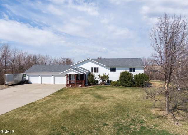 Property at 10710 Rose Dr, Bismarck, ND 58503, 5 beds, 3 baths