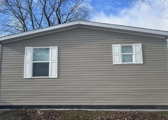 Property at 17050 Kropf Avenue Site #44, Davisburg, MI 48350, 3 beds, 2 baths