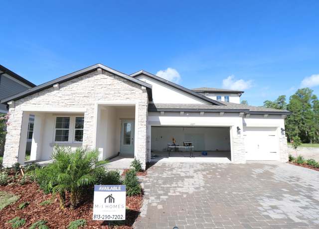 Property at 31215 Hayman Loop, Wesley Chapel, FL 33545, 5 beds, 4.5 baths