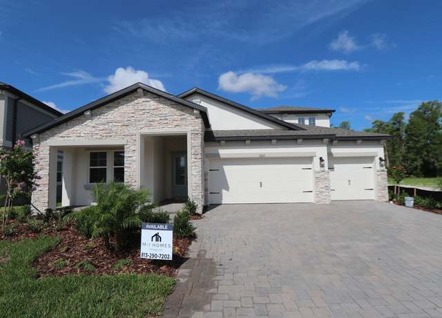 Property at 31215 Hayman Loop, Wesley Chapel, FL 33545, 5 beds, 4.5 baths