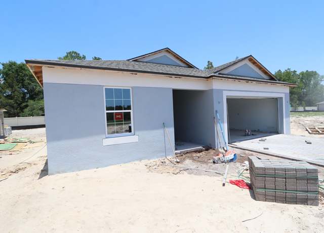 Property at 12885 Castle Oaks Dr, Hudson, FL 34669, 4 beds, 3 baths