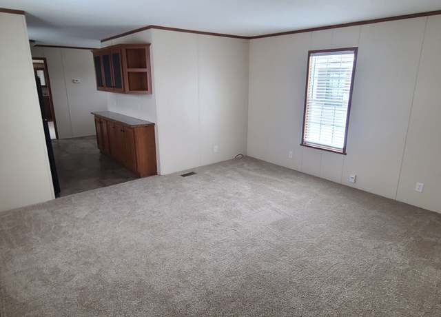 Property at 6131 Sandown, Grand Rapids, MI 49548, 3 beds, 2 baths