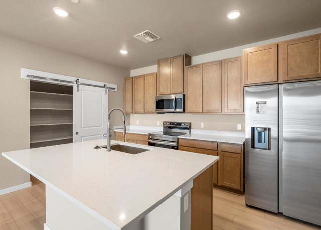 Property at 6153 N Ceylon St Unit 203-5, Denver, CO 80249, 2 beds, 2 baths