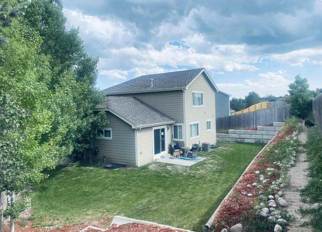 Property at 1408 Sunny Hl, Cheyenne, WY 82001, 4 beds, 3 baths