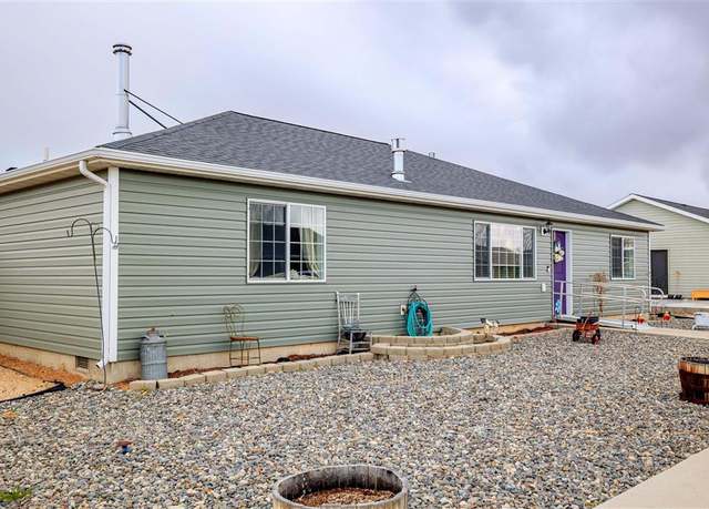 Property at 1142 E Madison St, Powell, WY 82435, 3 beds, 2 baths