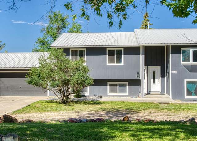 Property at 7631 Rimrock Dr W, Gillette, WY 82718, 4 beds, 3 baths