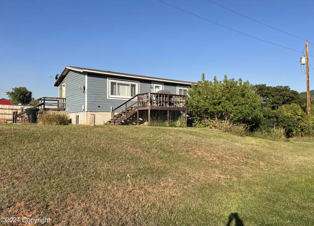 Property at 305 S 5th St, Sundance, WY 82729, 5 beds, 2 baths
