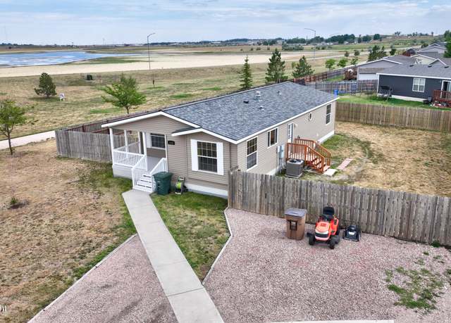Property at 1320 Orchid Ln, Gillette, WY 82716, 3 beds, 2 baths