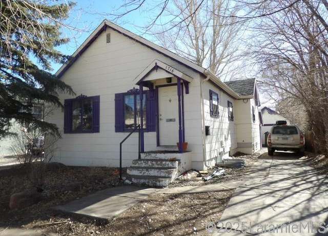 Property at 1716 E Garfield St, Laramie, WY 82070, 4 beds, 2 baths