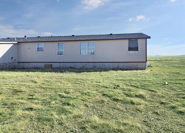 Property at 123 Wind In Wire Ranch Rd, Laramie, WY 82072, 4 beds, 2 baths