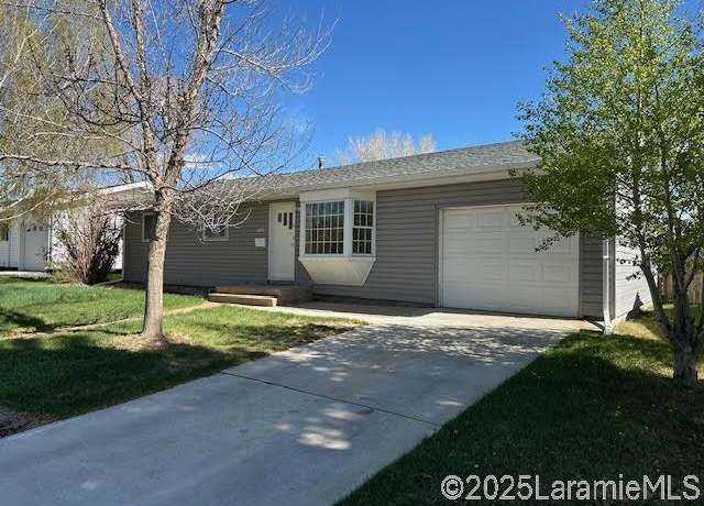 Property at 1320 W Hill Rd, Laramie, WY 82072, 5 beds, 2 baths