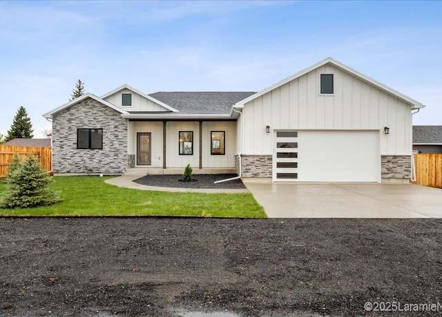 Property at 1669 E Jefferson St, Laramie, WY 82070, 3 beds, 2 baths