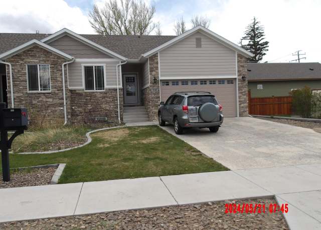 Property at 1110 E Gibbon St, Laramie, WY 82072, 4 beds, 2.5 baths