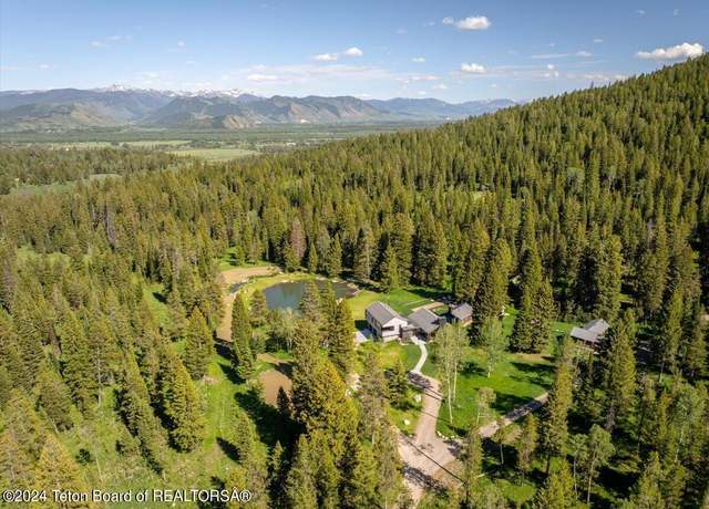 Property at 7000 W Gill Huff Rd, Wilson, WY 83014, 5 beds, 5 baths
