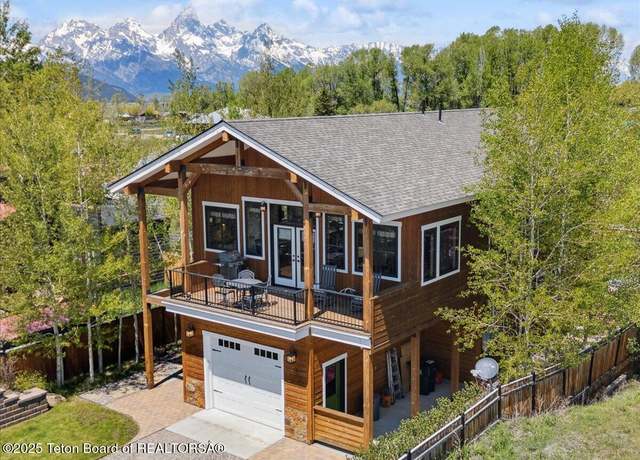 Property at 6895 E Little School Rd, Kelly, WY 83011, 4 beds, 3.5 baths