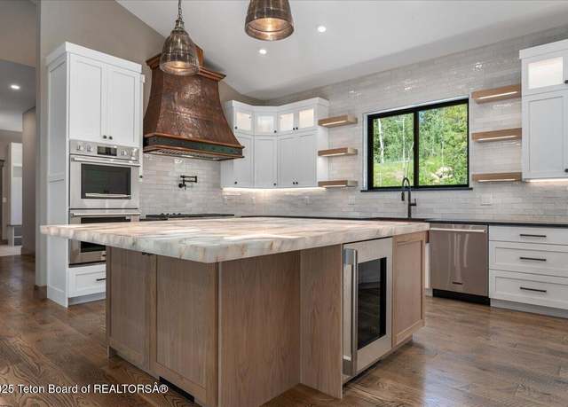 Property at 5727 Forest Ridge Rd, Victor, ID 83455, 4 beds, 3.5 baths