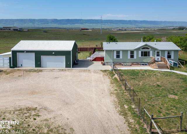 Property at 7459 Geary Dome Rd, Evansville, WY 82636, 5 beds, 3 baths