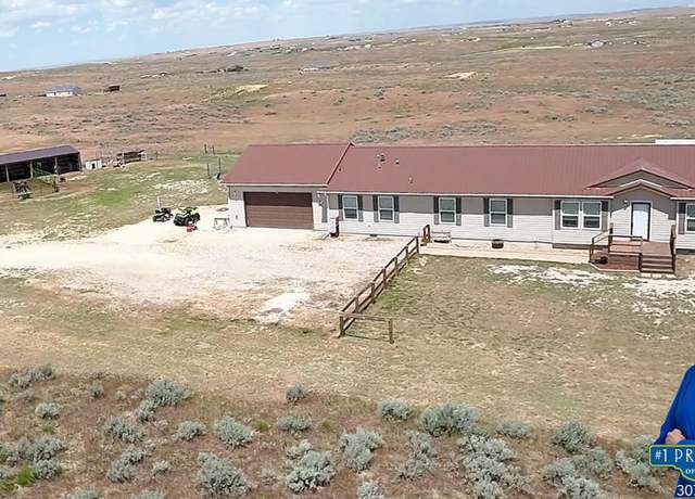 Property at 11406 Ridgeview Rd, Evansville, WY 82636, 4 beds, 2 baths