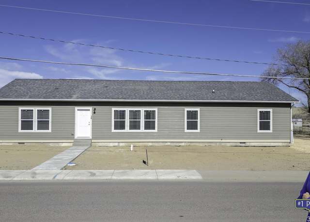 Property at 410 W Platte St, Glenrock, WY 82637, 4 beds, 2 baths