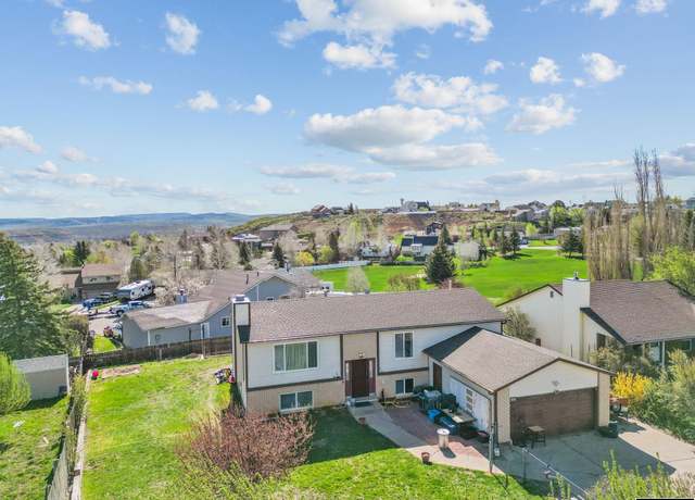Property at 104 Canyon Hollow Drive Dr, Evanston, WY 82930, 5 beds, 3 baths