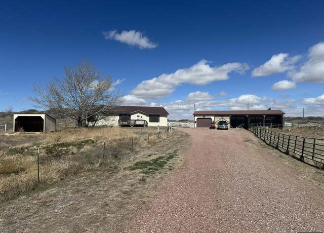 Property at 111 Rock Ridge Dr, Torrington, WY 82240, 3 beds, 2 baths