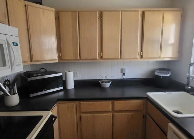 Property at 201 La Paloma Dr, Rawlins, WY 82301, 4 beds, 1.75 baths