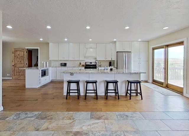 Property at 249 Aspen Hills Ct, Evanston, WY 82930, 5 beds, 3 baths