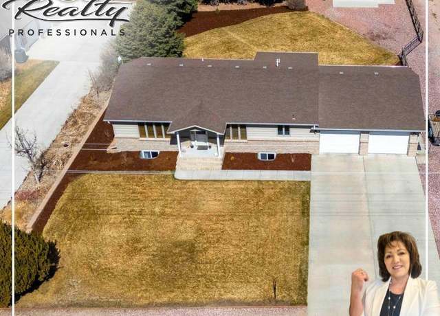 Property at 1102 E 28th Ave, Torrington, WY 82240, 4 beds, 3 baths