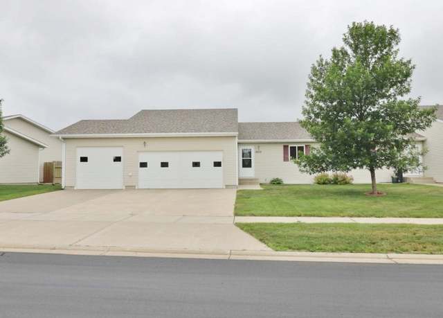 Property at 2033 14th St NW, Minot, ND 58703, 4 beds, 3 baths