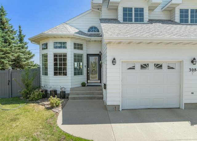 Property at 308 28th St NW, Minot, ND 58703, 4 beds, 4 baths