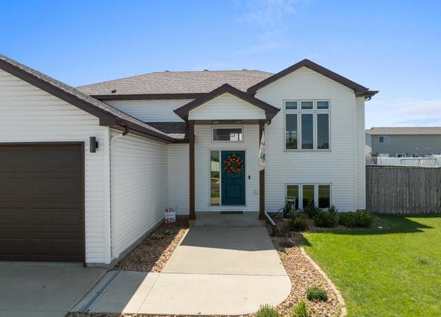 Property at 73 Olive Tree Cir NE, Minot, ND 58703, 4 beds, 3 baths