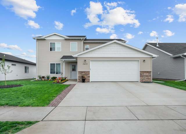 Property at 2413 Ivory St NW, Minot, ND 58703, 4 beds, 2.5 baths