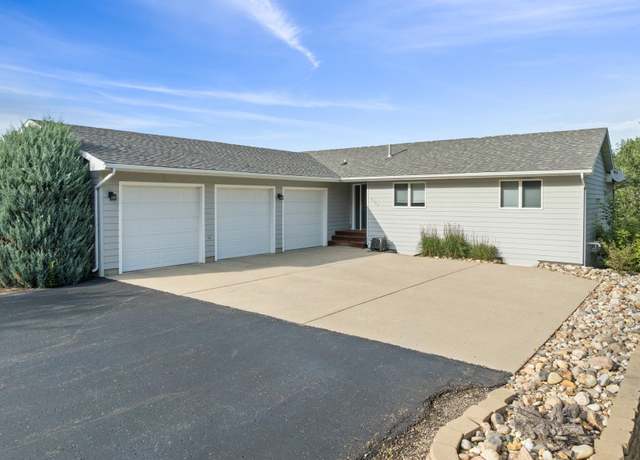Property at 2700 63rd St NW, Minot, ND 58703, 5 beds, 3.5 baths