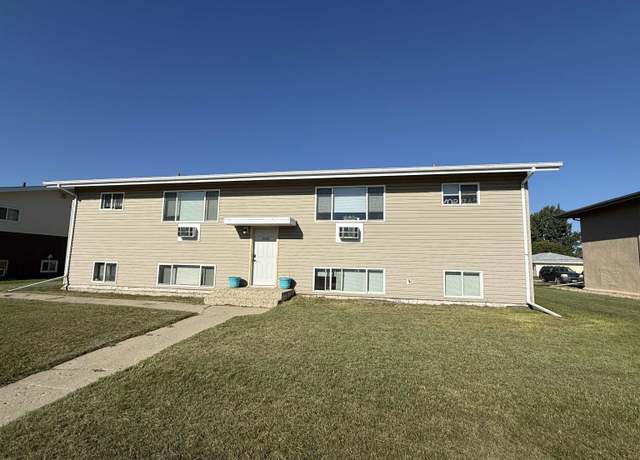 Property at 2033 5th St NW, Minot, ND 58703, 7 beds, 2 baths