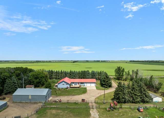 Property at 1100 72nd Ave NE, Minot, ND 58703, 3 beds, 4 baths
