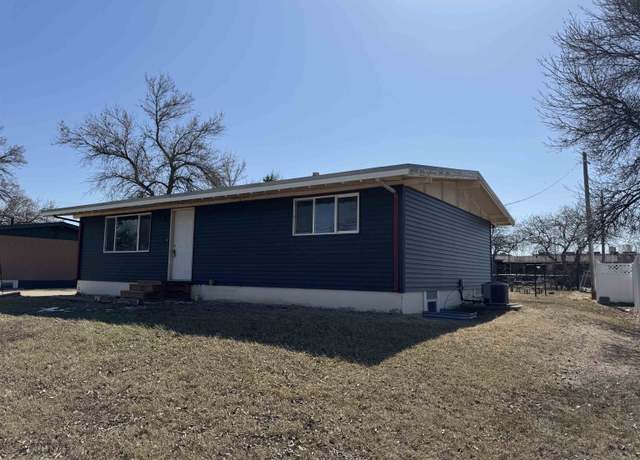 Property at 1709 Central Ave W, Minot, ND 58701, 4 beds, 3 baths